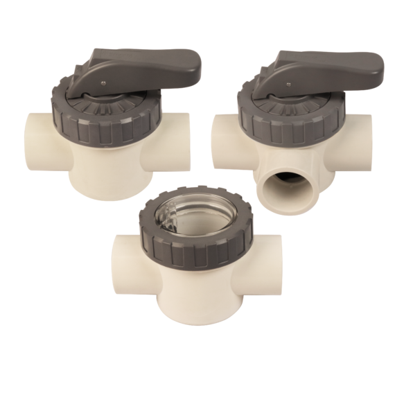 Three valves with white-coloured bodies and purple handles or covers. 2-Way Valve on top left, 3-Way Valve on top right, check valve with transparent cover on bottom middle